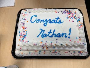 Cake saying "Congrats Nathan!"